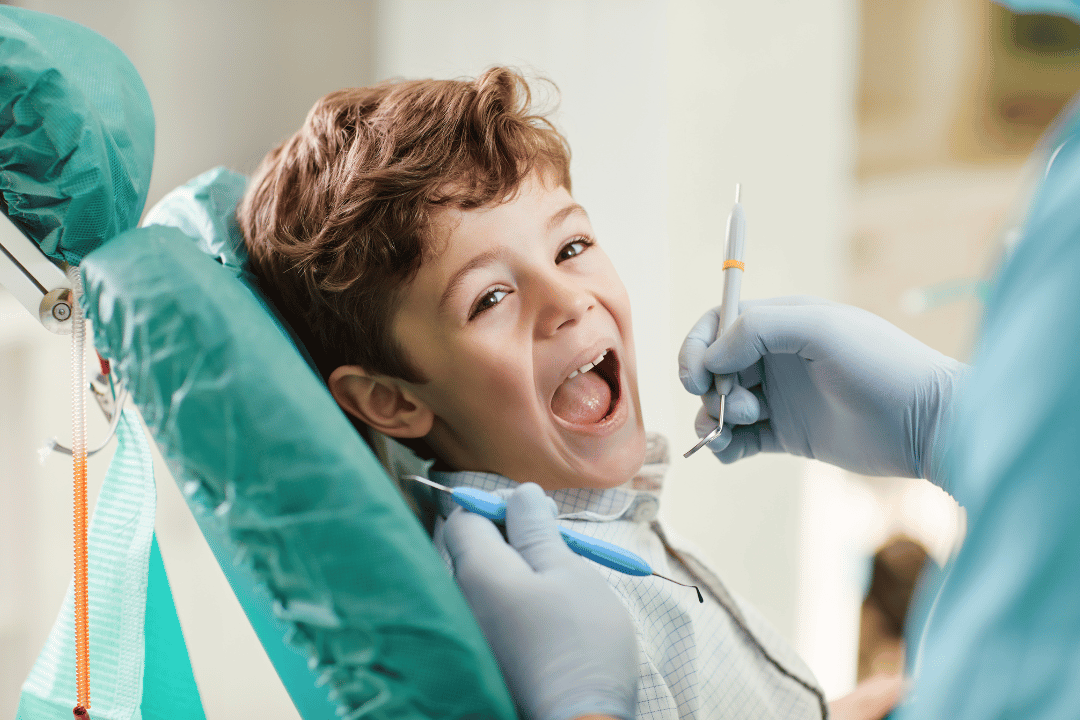child at dentist chair bethesda