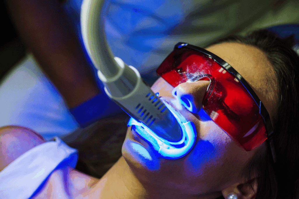 patient receiving in-office whitening treatment