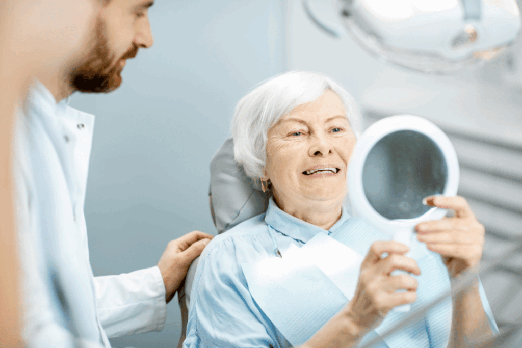 patient smiling with new dentures Bethesda